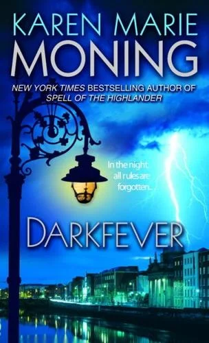 Night cover with an ornate iron street lamp, a lightning strike and a lit riverside street of old buildings