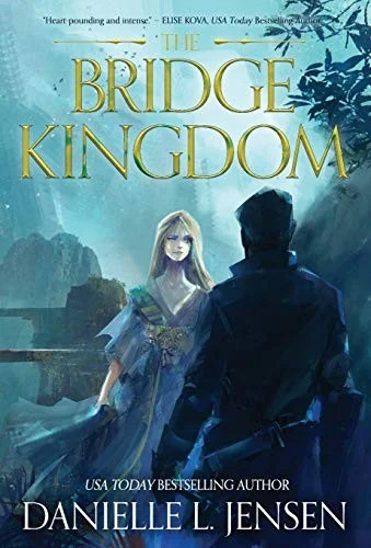 The Bridge Kingdom cover with a woman in a pale gown and a man in a dark cloak facing a misty bridge