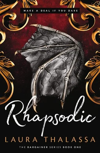 Rhapsodic cover with a grey bat-like wing over red and gold scrollwork and the line make a deal if you dare