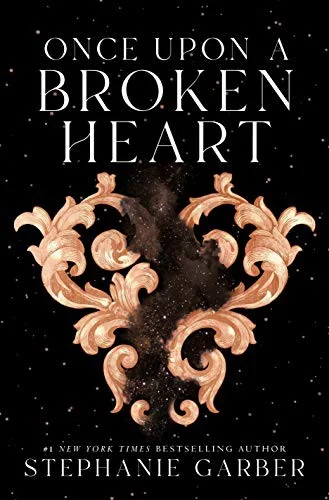 Once Upon a Broken Heart cover with copper ornamental scrollwork shaped like a broken heart on black