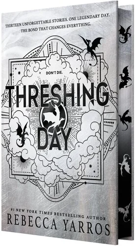 Silver-white Threshing Day hardcover with black title lettering, swirling clouds, a small dragon and black dragons on the page edges